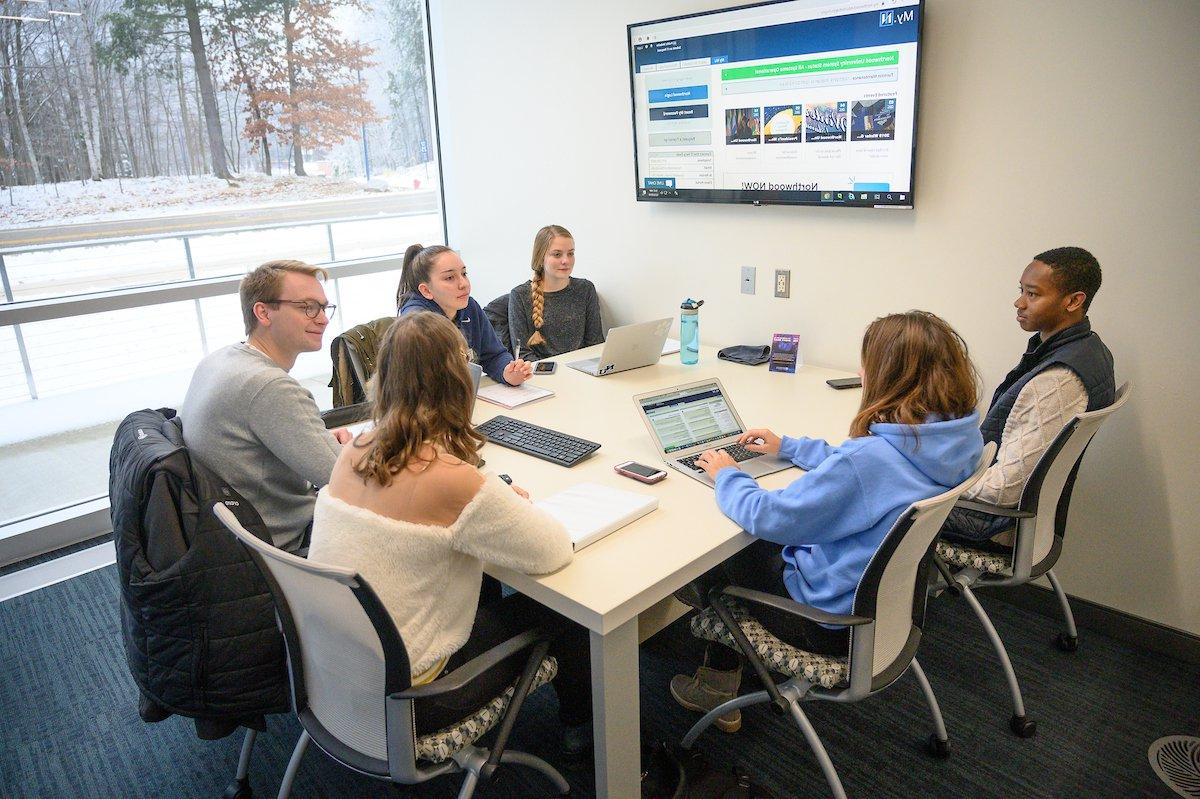 Group of students studying in a private study room